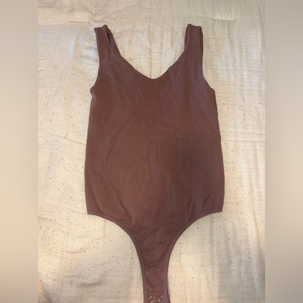 Brown bodysuit